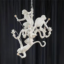 Resin LED pendant ceiling light with climbing monkey, creative animal nordic design