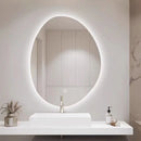 Irregular shaped LED mirror for smart dressing rooms and bathrooms