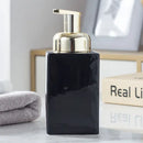 ceramic soap dispenser with gold pump for bathroom