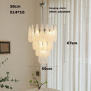 Coloured glass pendant with decorative leaf for chic interiors