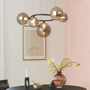 Nordic smoked glass and gold chandelier for modern interiors