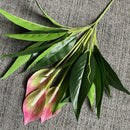 Tropical artificial monstera and anthurium plants for indoor decoration