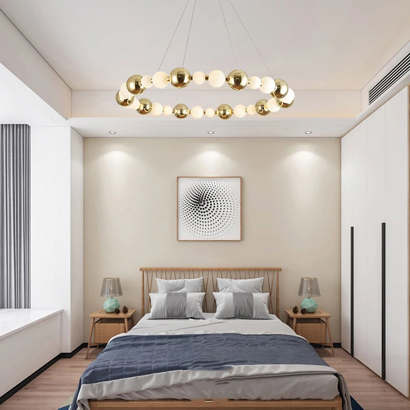 LED chandelier with acrylic ball, gold ring and adjustable wires