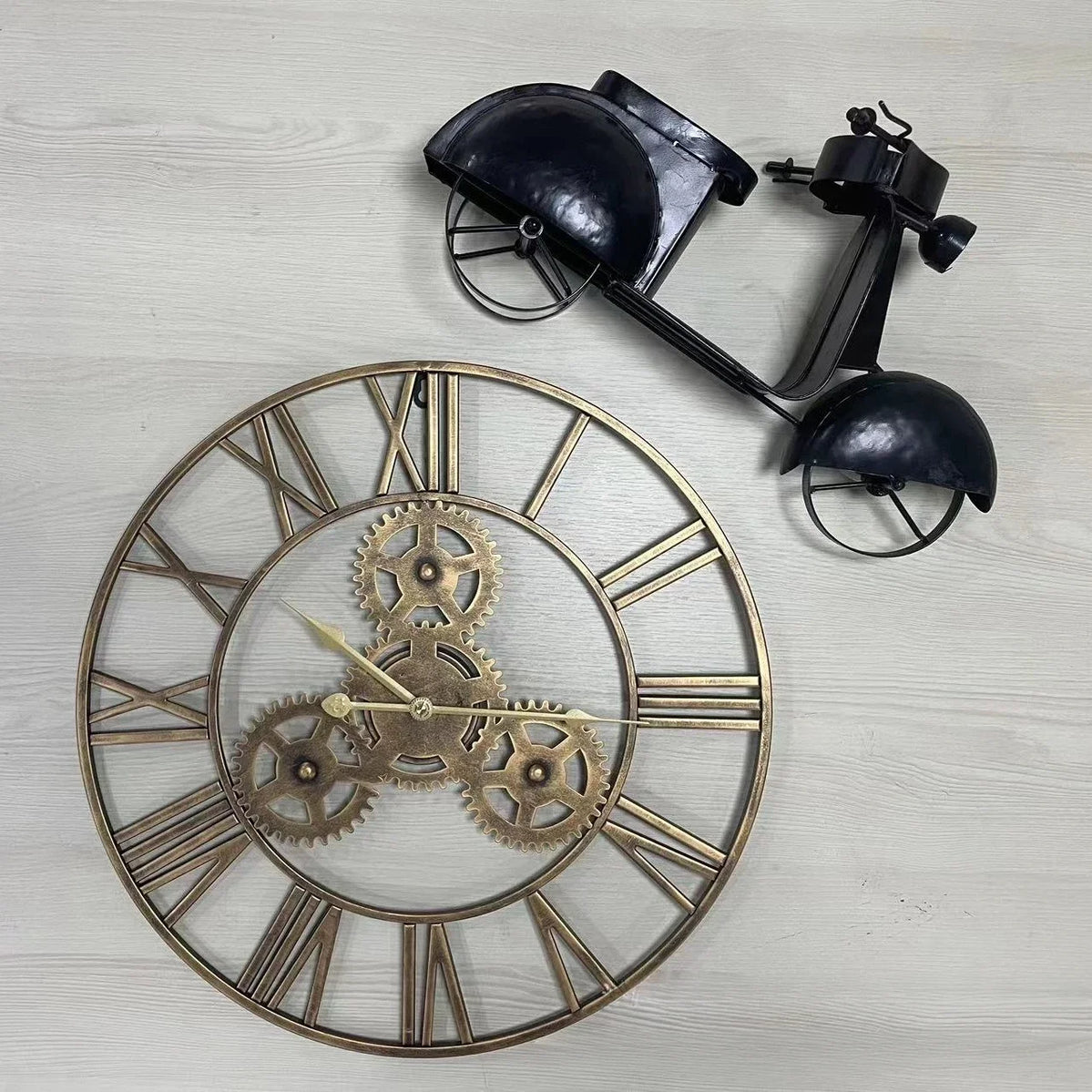 retro metal wall clock with large decorative gear