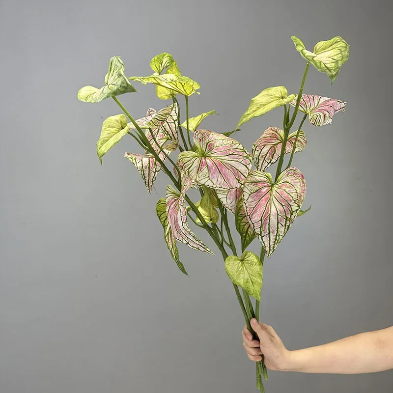 Artificial palm leaves for indoor floral decoration