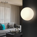 Minimalist glass LED wall light for indoor use