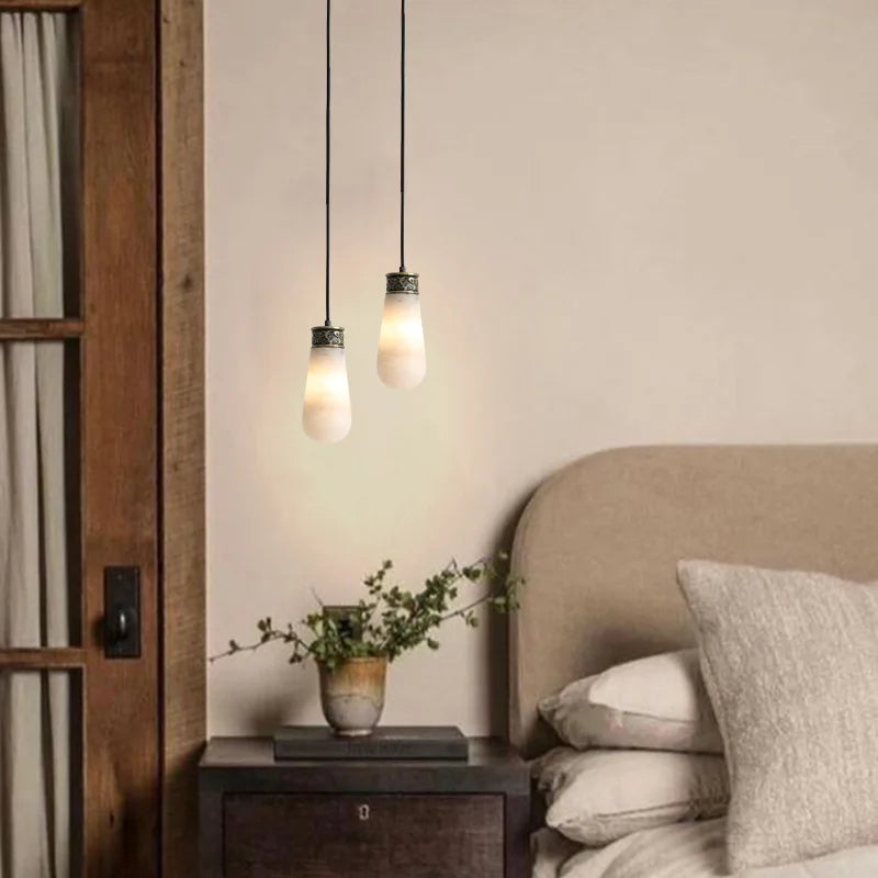 Creative marble and jade pendant light for interiors