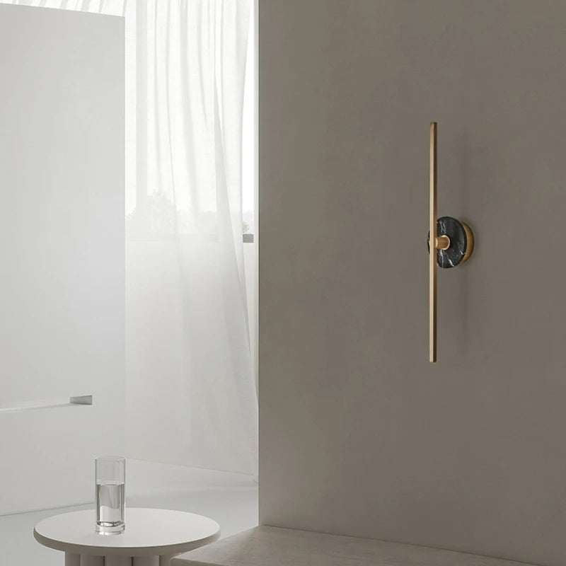 Minimalist natural marble wall light with brass line