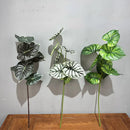 Set of 2 decorative artificial green plants in plastic