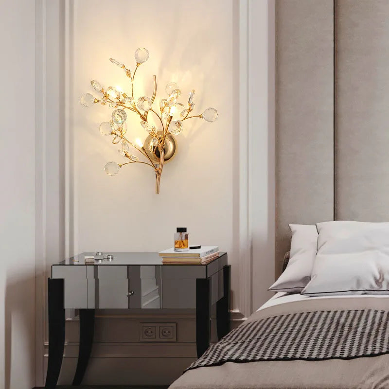 Crystal wall light with romantic metal flower branches