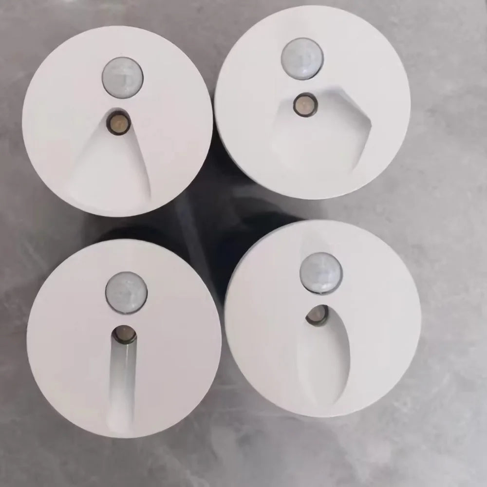 Sandiy round LED wall light with motion sensor