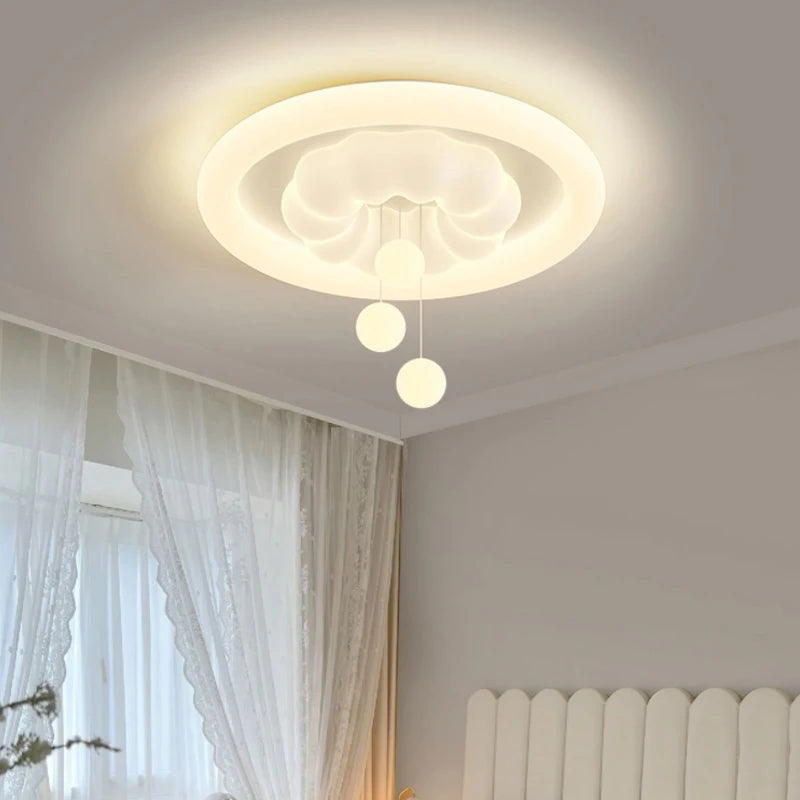 Cloud ceiling light for children's room in creamy playful style
