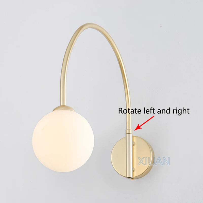 Decorative glass swing arm wall light for elegant interiors