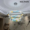 Modern dimmable LED chandelier with decorative steel ring