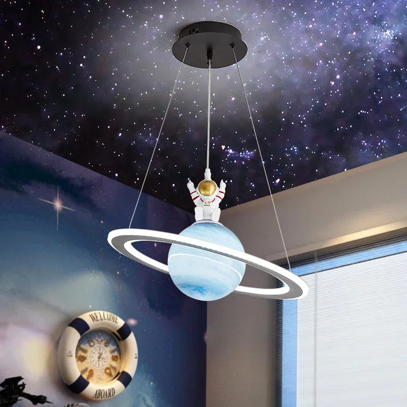 Nordic astronaut and planet pendant light