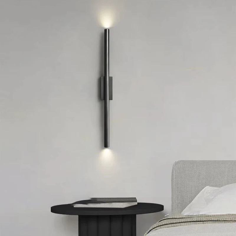 Modern black and copper brass wall light with natural light