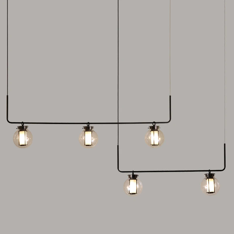 Minimalist glass pendant light for creative and retro spaces