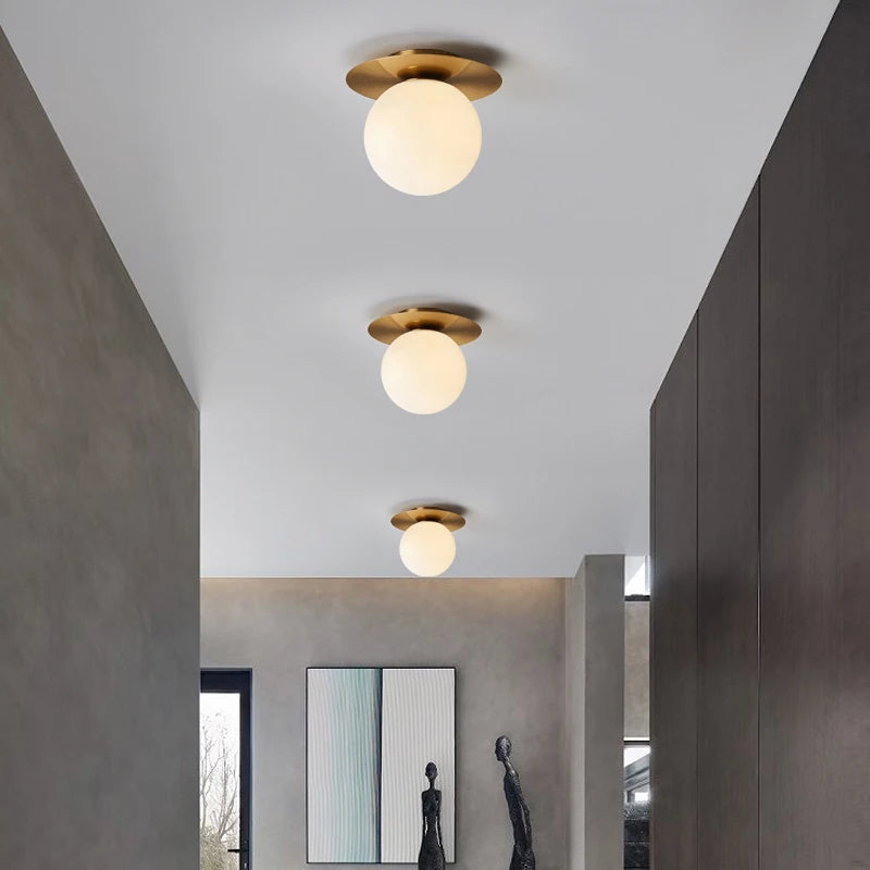 Nordic LED ceiling light with frosted glass globe for indoors