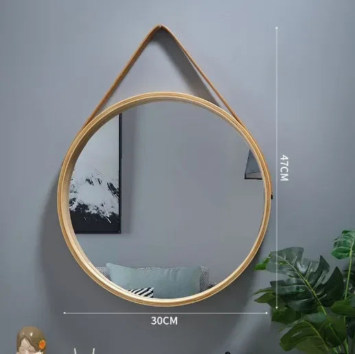 round wall mirror with thick wooden border