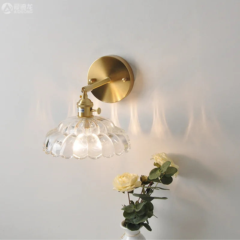 Glass and copper wall light with decorative floral design