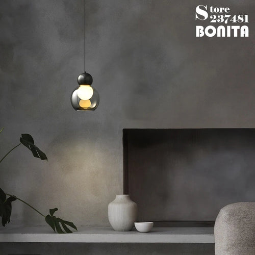 Transparent glass pendant light with decorative copper head - vue 7 sur 10