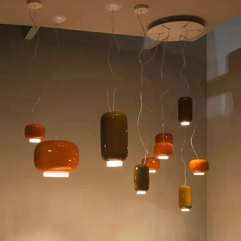 Modern glass pendant light with adjustable cord for various spaces