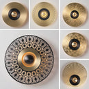 Carved copper wall light with decorative LED lighting