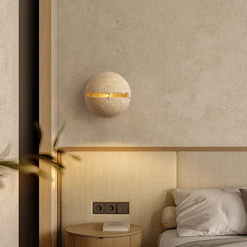 Retro wall light in natural stone dinosaur egg design