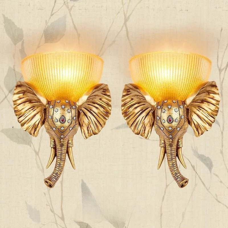 Decorative glass and resin elephant wall light