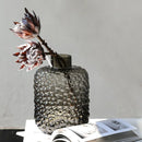 clear glass vase with black dots for decoration and floral arrangements