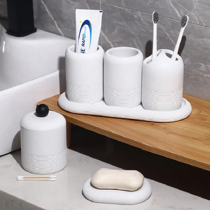 modern bathroom accessory set made of sand and gravel - vue 3 sur 18