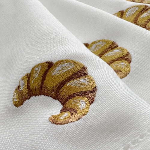 Embroidered linen napkin with croissant motif, customisable - vue 6 sur 7