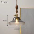 Walnut and copper glass pendant light for elegant interiors