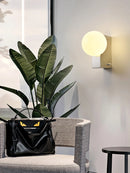 Minimalist stainless steel wall light for modern interiors