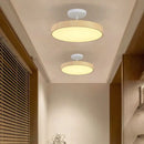 Modern round ceiling light with wood-effect finish for elegant interiors