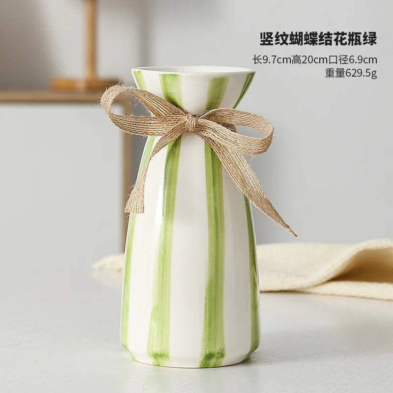 modern ceramic vase with bow for dried flowers