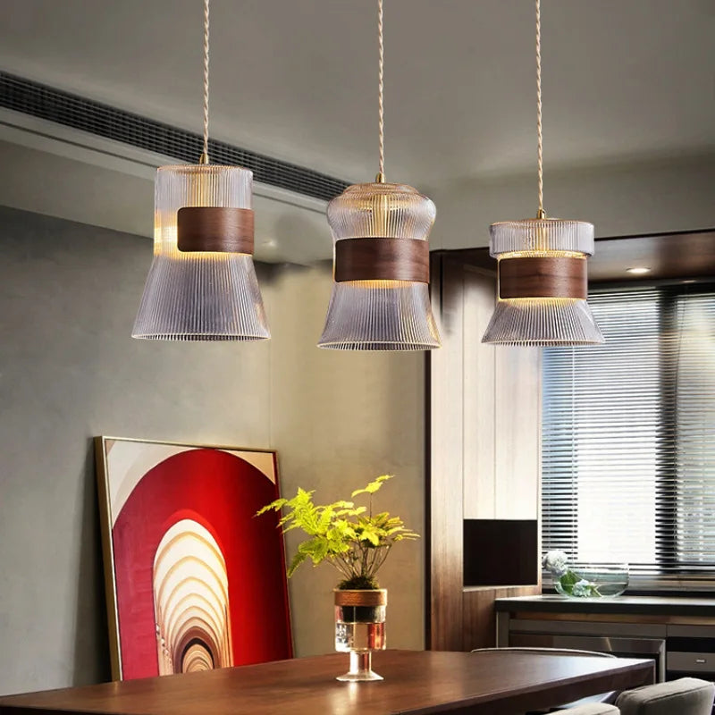 Adjustable modern glass, wood and copper pendant light