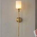 Natural marble wall light with brass bulb