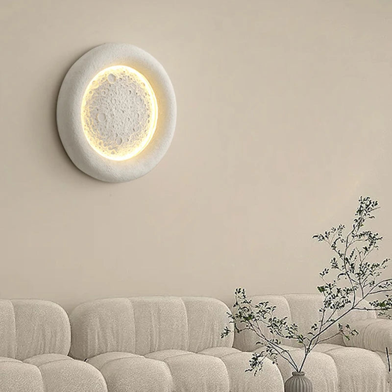 Round moon LED wall light with interchangeable art deco design