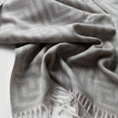 Jacquard wool throw with meander pattern, warm Chinese style