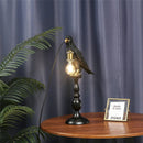 Modern resin bird-shaped desk lamp with golden beak