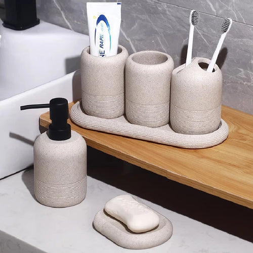 modern bathroom accessory set made of sand and gravel - vue 3 sur 18