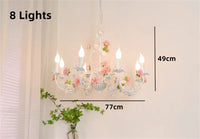 Wrought iron chandelier with romantic rose floral decoration