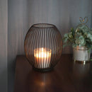 Geometric hollow iron candle holder for interior decor