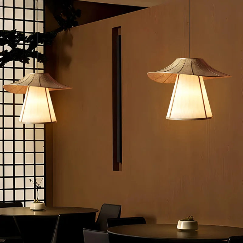 Elegant modern wabi-sabi fabric pendant light with woven rattan