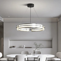 Minimalist iron pendant light with rippled glass for modern interiors