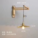 Elegant extendable copper wall light for multiple spaces