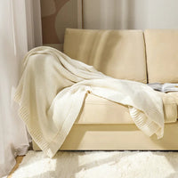 Nordic style chequered knitted throw for living room