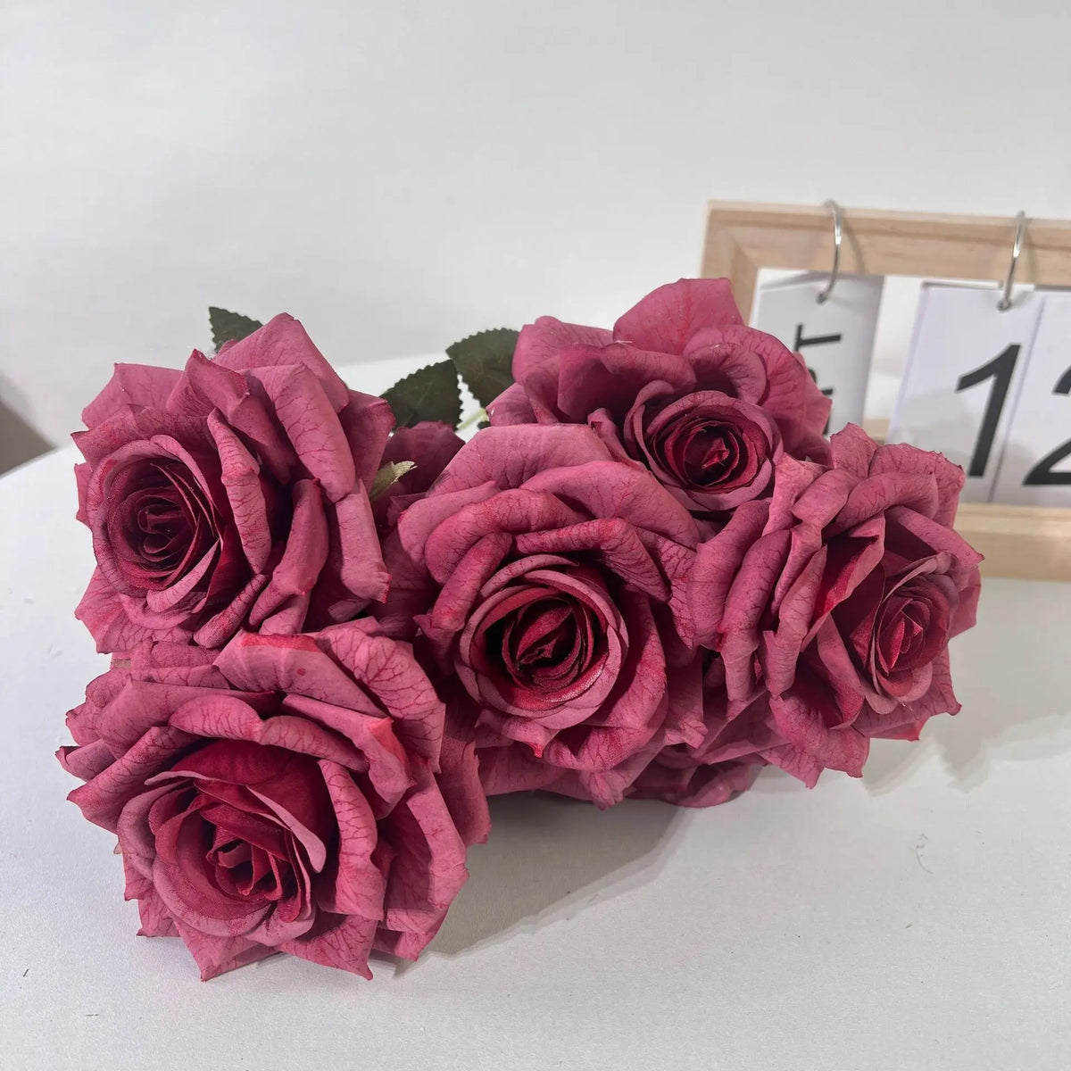 Decorative artificial silk rose bouquet for interior