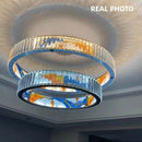 Modern dimmable LED chandelier with decorative steel ring
